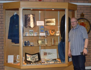 Our Exhibition Assistant, Ian Mackintosh, with the display of material from Sir Peter Heatly's collection he created for the exhibition in the Dewars Centre, Perth.